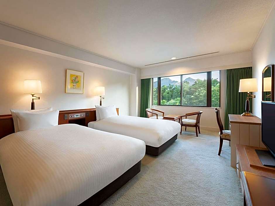 Photo 1 of 5 of Classic Deluxe 4 Single Beds Suite, Mountain View