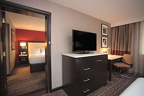 Connecting Family Room with Queen Bed and Two Sofa Beds