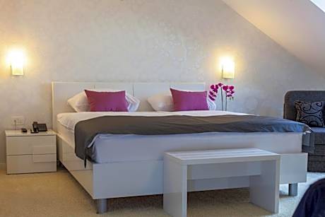 Luxury Suite with Side Sea View and Balcony