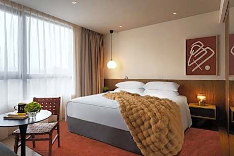 Deluxe Corner King Room with Sofa Bed