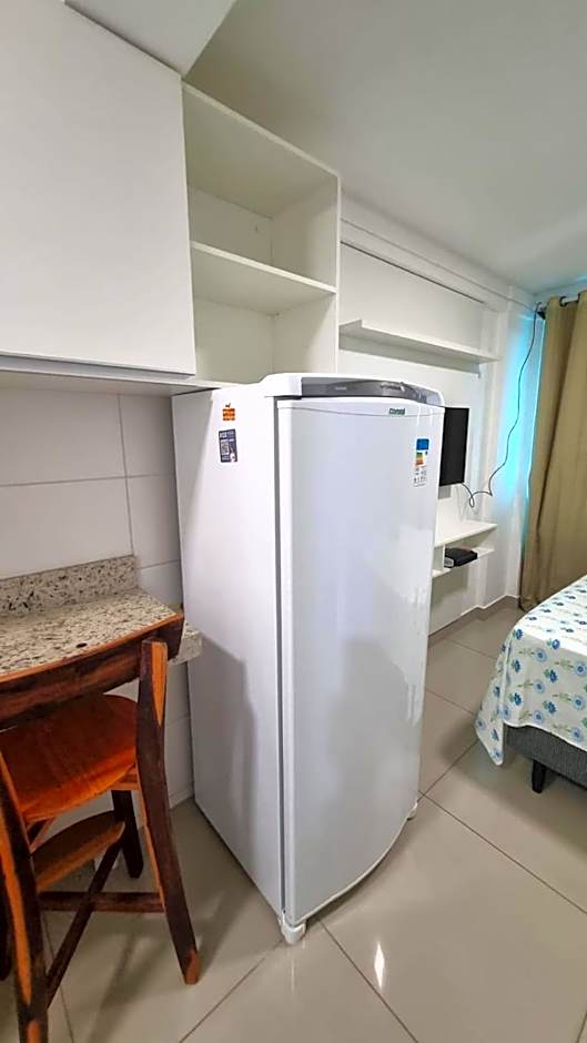 Confortável Flat com piscina de borda infinita na cobertura