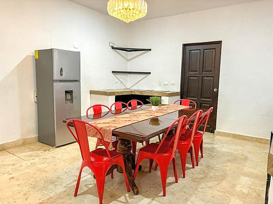 "Spacious Suite with 4 Bedrooms and Amenities"