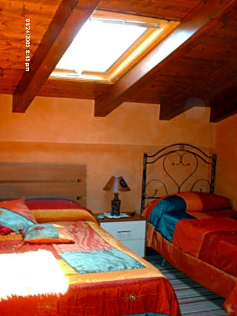 Quadruple Room with Private Bathroom