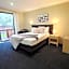 TOWER JUNCTION MOTOR LODGE- Motel with Airport and Railway Station Transport Service