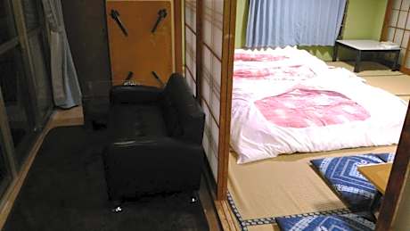 Japanese-Style Family Room with Shared Bathroom and Ocean View