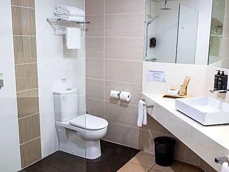 Deluxe Suite with One Queen Bed and Two Single Beds