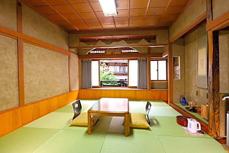 Quadruple Room with Shared Bathroom