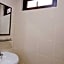 Capital O 90897 Island City Hotel