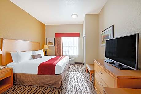 1 King Bed, Mobility Accessible, Communication Assistance, Roll In Shower, Kitchenette, Non-Smoking,