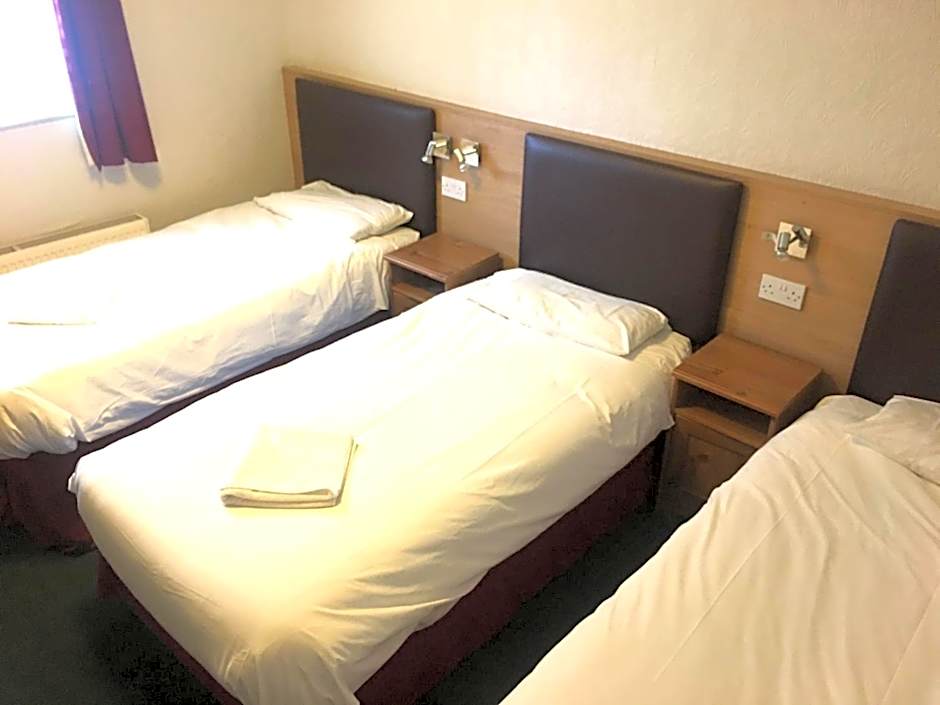 Photo 1 of 10 of Triple Room