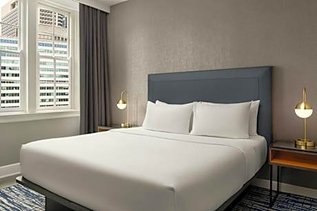 One-Bedroom King Suite with Sofa Bed and City View