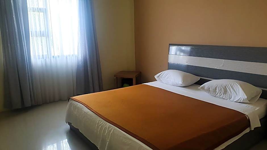 OYO 91266 Markoni 18 Guest House