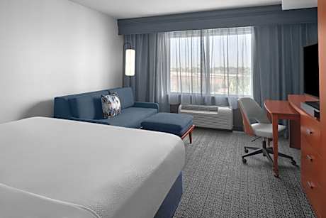 King Room with Sofa Bed and Roll-in Shower - Mobility and Hearing Accessible
