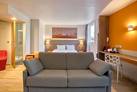 Junior King Suite with Sofa Bed and Pool View