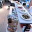 Rena Grand Residence & Suit