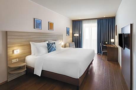 King Room with Balcony and City View