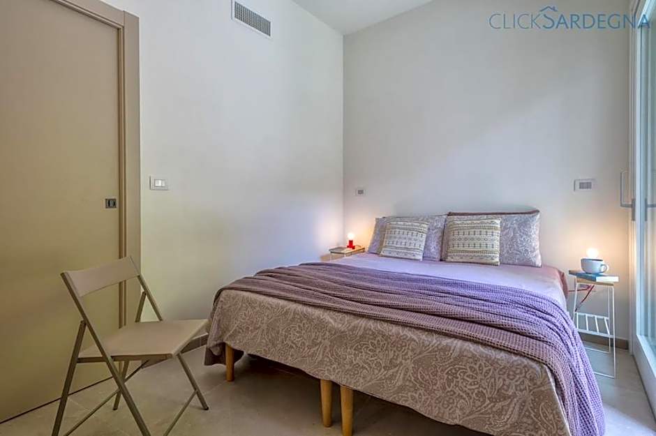 ClickSardinia Alghero Spectacular waterfront Neptune apartment with sea-facing terraces and garden