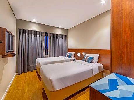 Superior room with 2 single beds and a sofa bed