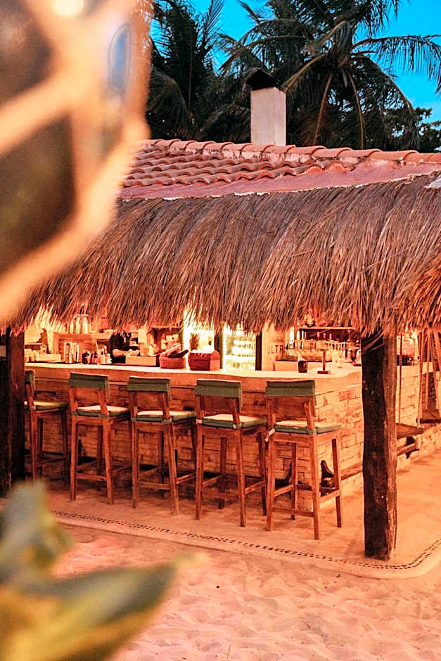 Petit Lafitte Beach Front Hotel & Bungalows