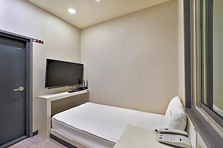 dormitory room with single bed