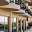 Olivia Palm Hotel