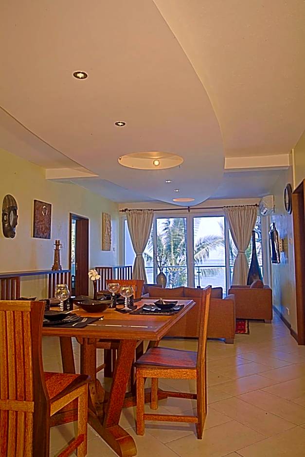Cowrie Shell Beach Apartments Official