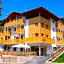 Alpine Mugon Hotel