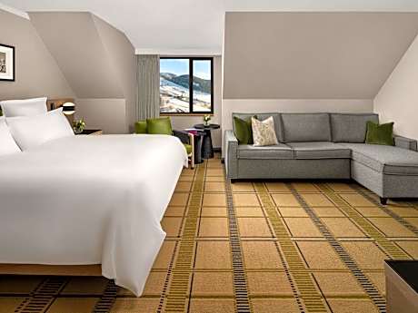 Deluxe King Room with Seating Area and Sofa Bed