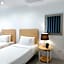 Sea Green Boutique Rooms