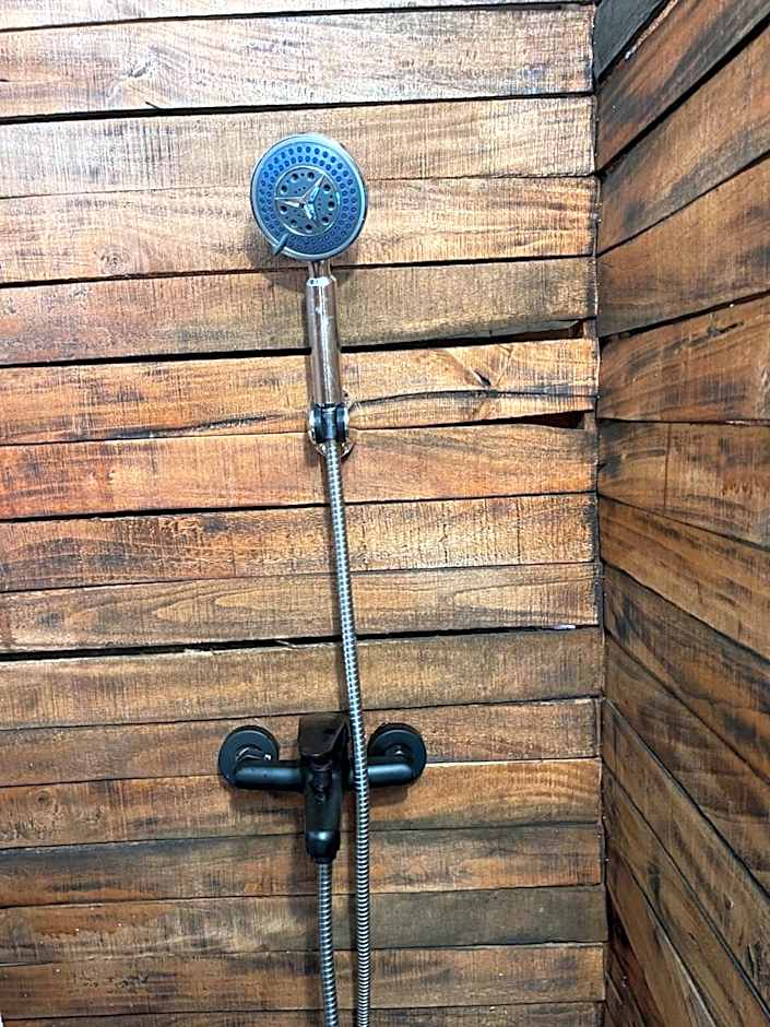 Triangular house and hot spring