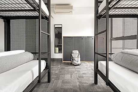 Bed in 4-Bed Female Dormitory Room with Shared Bathroom