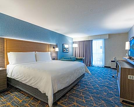 Standard King Room with Sofa Bed and Balcony - Partial City View