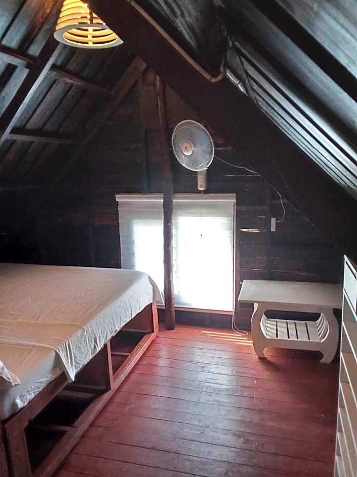 Bayawan Sunset Inn next to julsam and orange house