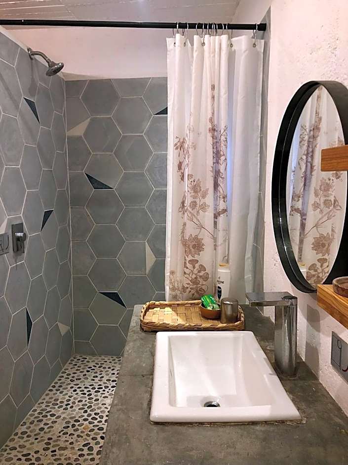 Departamento en planta baja con patio, dos habitaciones con dos ba¿os completos sala y cocina integral Vistas desde la azotea de