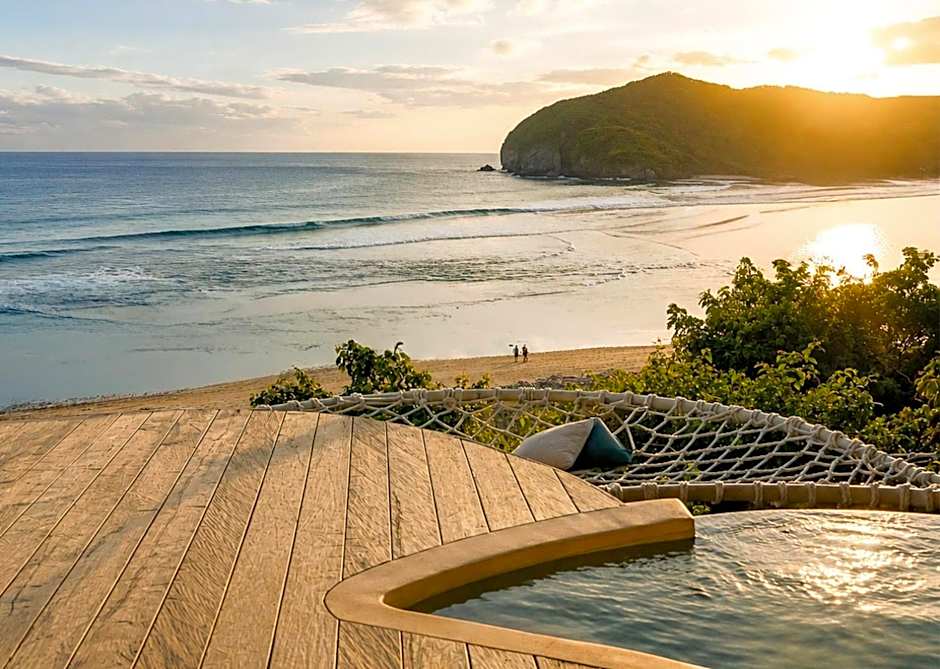 Kini Resort - Luxury Beachfront Bamboo Resort