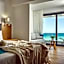 Cavo Orient Beach Hotel & Suites