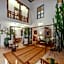 Riad Le J