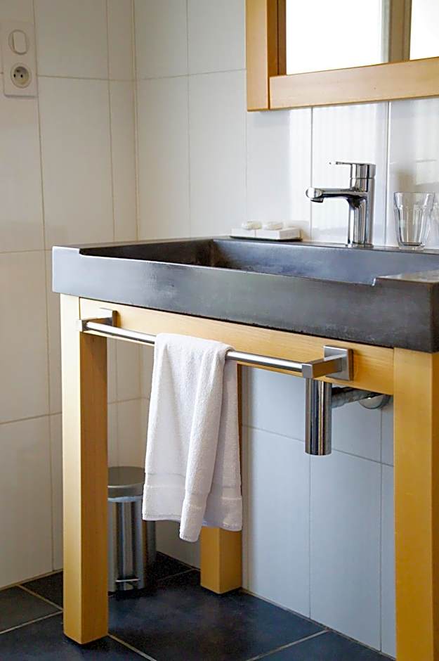 A Propos- Suites et chambres