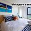Flat com 2 quartos - Vista Morro do Careca - 250m Mar e Garagem