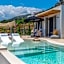 Mnḗmē Suites & Villas