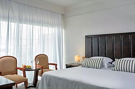 Double or Twin Room with Inland View (2 Adults + 1 Child)