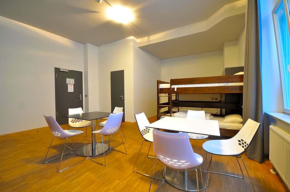 Photo 1 sur 4 de Bed in 4-Bed Mixed Dormitory Room