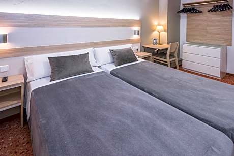 Triple Room (2 Adults + 1 Child)