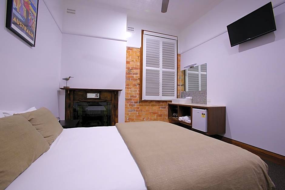 Photo 1 of 4 of Queen Room with Shared Bathroom