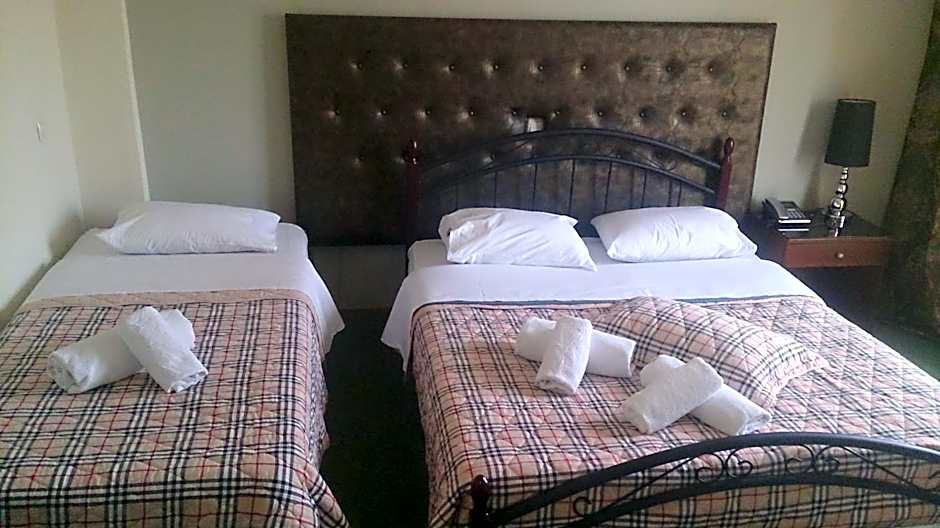 Photo 1 of 4 of Triple Room