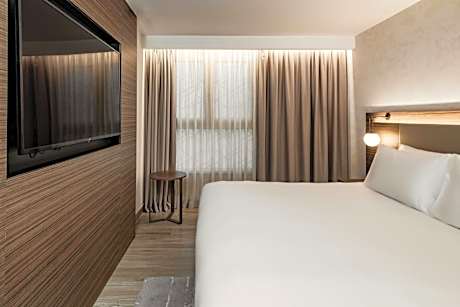 One-Bedroom King Suite with Sofa Bed and City View