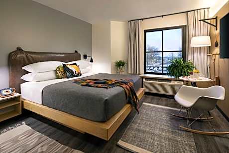 One-Bedroom King Suite with Two Specialty Beds and Transfer Shower - Mobility Access
