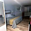 Apm Inn & Suites