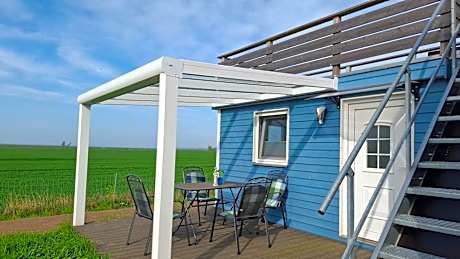 Prima Camping Resort Boddenblick -Stellplätze-Schlaffässer-Tiny Houses in Ostsee Nähe