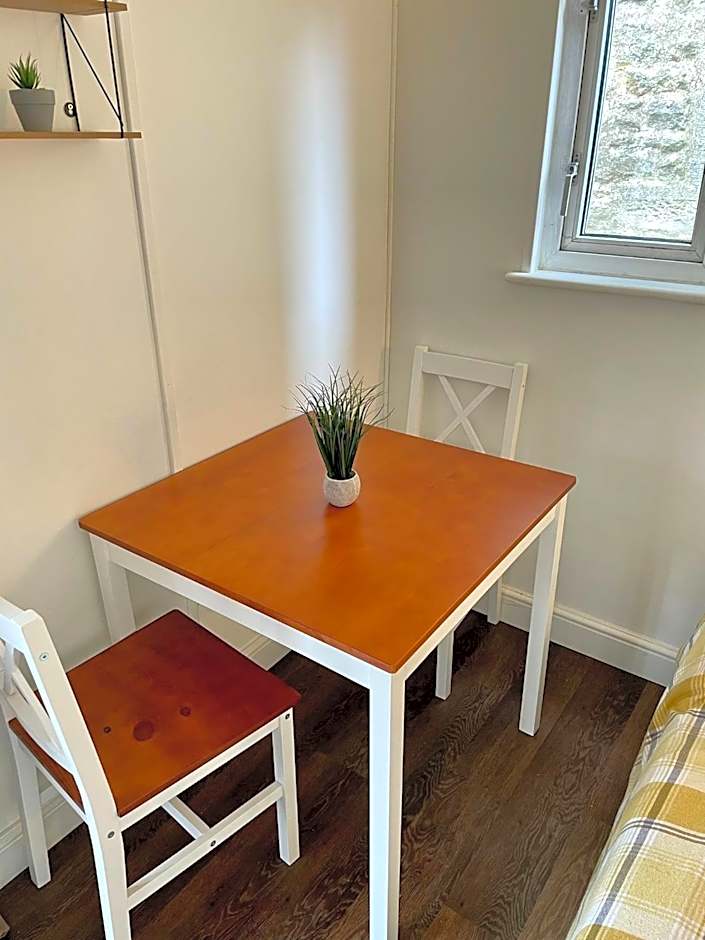 Apple tree hut, in a private garden